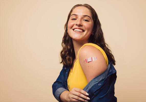 Young woman who received a flu vaccine. Jacob Lund - stock.adobe.com
