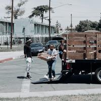 Image - Volunteers unloading truck