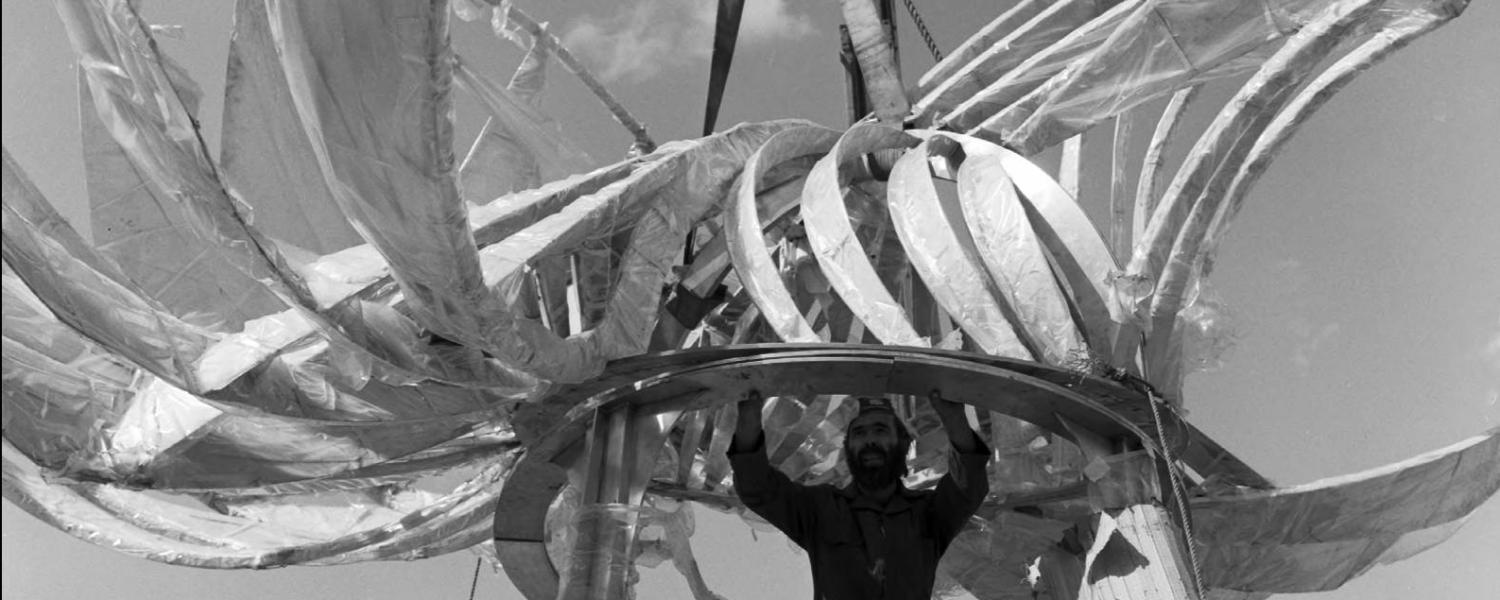 George A. Norris installing his untitled sculpture (dubbed The Prairie Chicken by students) during redevelopment of Swann Mall
