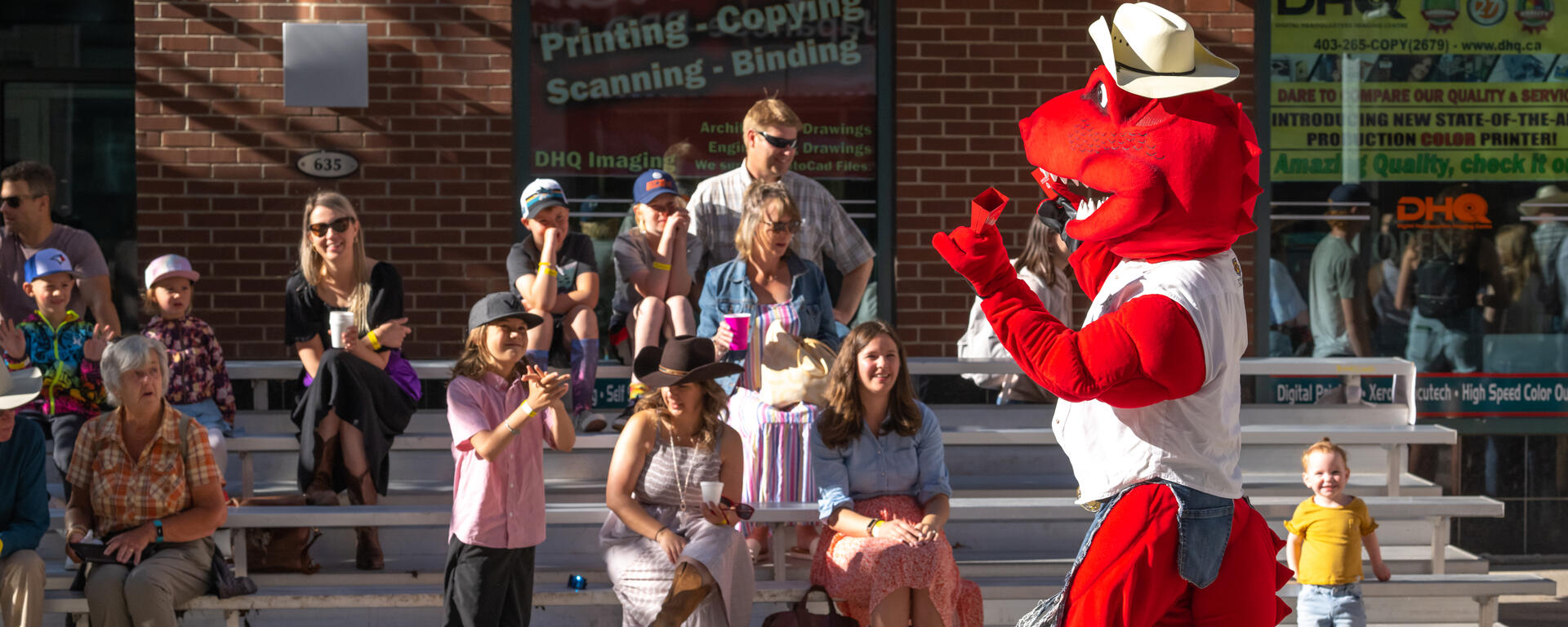 Rex dino mascot and community event