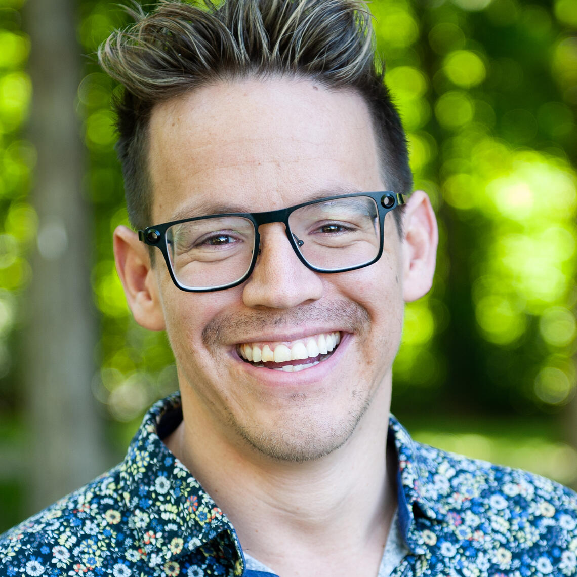 Gregory John's headshot