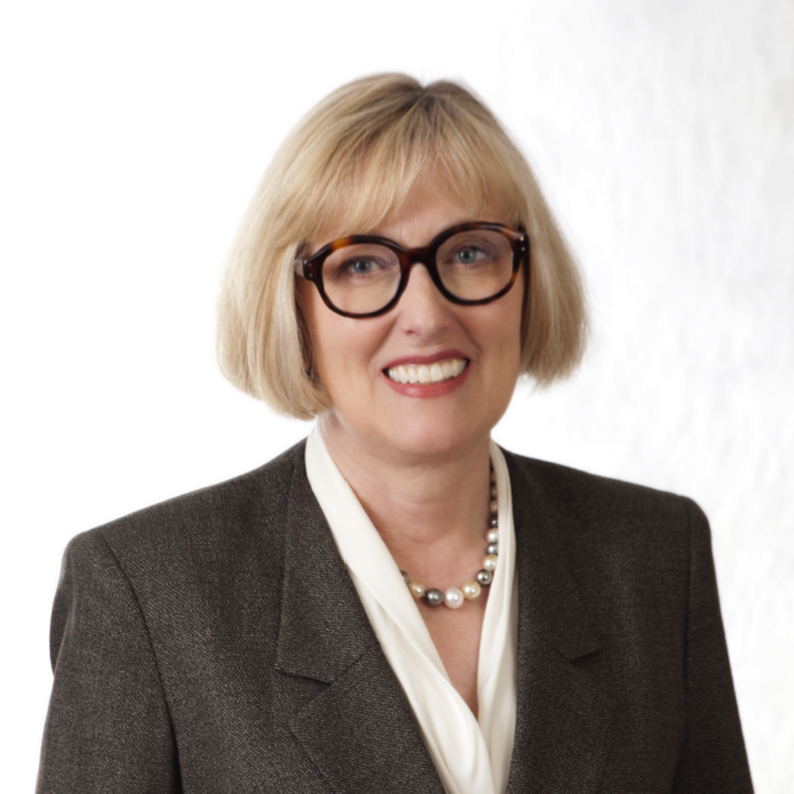 Ann Calvert smiling at the camera