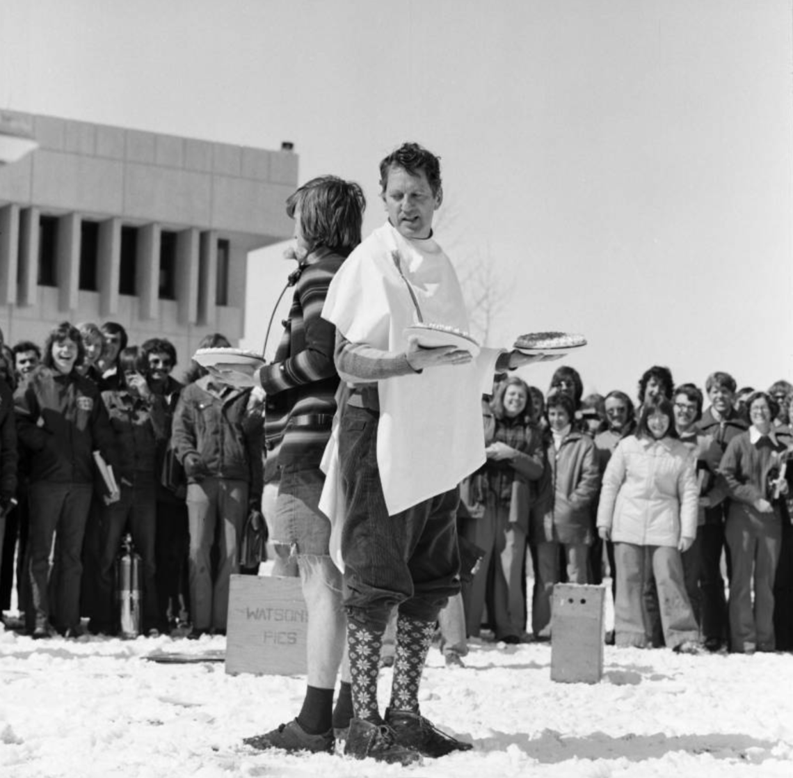Bermuda Shorts Day A.W.R. Carrothers, president of the University of Calgary, preparing to have a pie duel with the Students’ Union president.