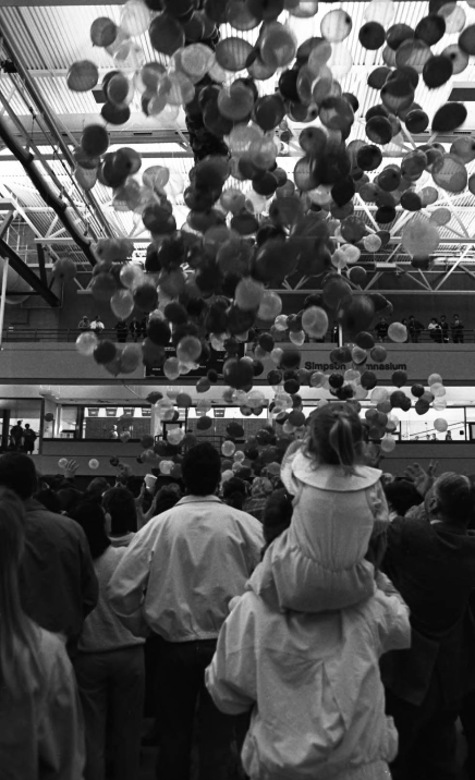 Image of balloons rising to the ceiling of the Jack Simpson Gymnasium during the University of Calgary's 25th anniversary celebration.