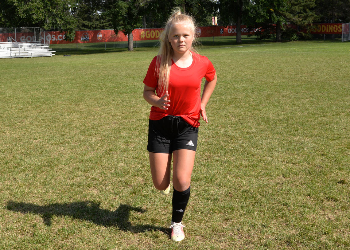 Soccer athlete performing hops on the spot