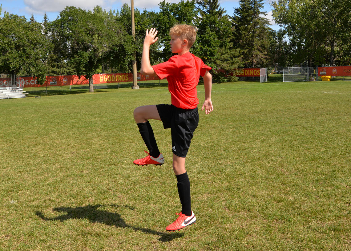 Soccer athlete performing power skips