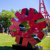 Large 3D spark on wheels in front of the Olympic Oval