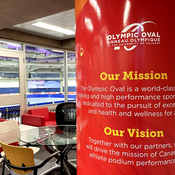 Large support pillar wrapped in colourful graphics