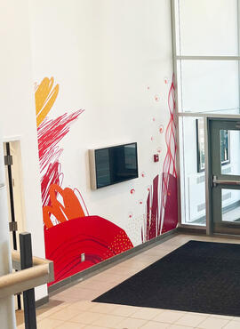 Start something graphics decorating the walls of a lobby
