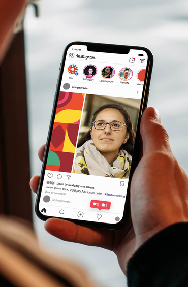 Person holding a phone looking at social media