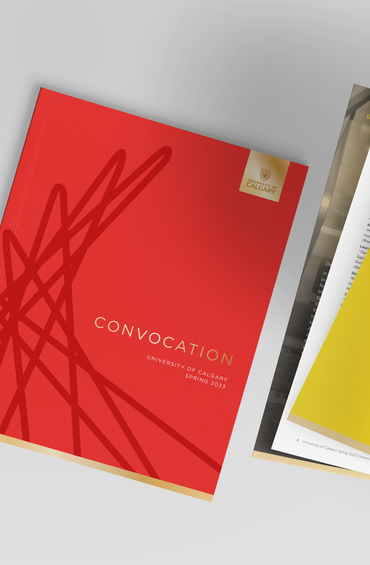 Printed program with a red cover with gold details