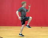 Athlete performing A skips forward and backward