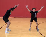 Athletes performing Y component of the IYTW exercise