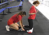 Athletes preforming nordic hamstring exercise