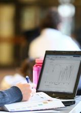 student looking at a laptop